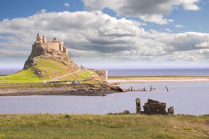 Driver-guided coach from Castle Terrace to Lindisfarne, Bamburgh views and Alnwick, on a tour of Alnwick Castle, castle tours in Europe